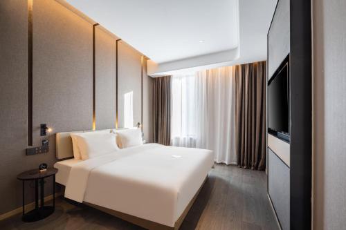 Imagen general del Hotel Atour Chifeng Hongshan Sport Center. Foto 11