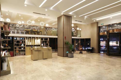 Imagen general del Hotel Atour Chongqing Shapingba High Speed Railway Station Sanxia Plaza. Foto 2