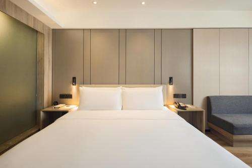 Imagen de la habitación del Hotel Atour Chongqing Shapingba High Speed Railway Station Sanxia Plaza. Foto 12
