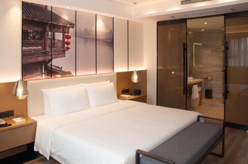 Imagen de la habitación del Hotel Atour Chongqing Shapingba High Speed Railway Station Sanxia Plaza. Foto 13
