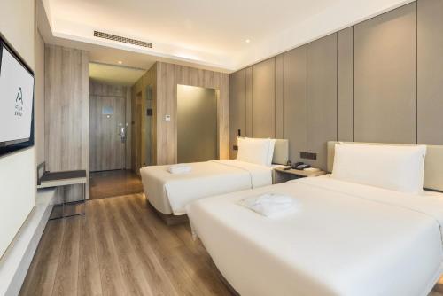 Imagen de la habitación del Hotel Atour Chongqing Shapingba High Speed Railway Station Sanxia Plaza. Foto 14