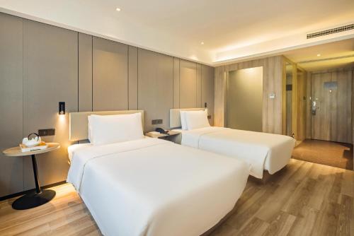 Imagen de la habitación del Hotel Atour Chongqing Shapingba High Speed Railway Station Sanxia Plaza. Foto 16