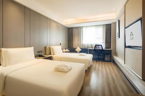 Imagen de la habitación del Hotel Atour Chongqing Shapingba High Speed Railway Station Sanxia Plaza. Foto 17