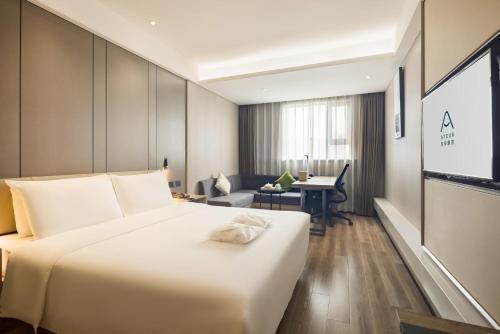 Imagen de la habitación del Hotel Atour Chongqing Shapingba High Speed Railway Station Sanxia Plaza. Foto 18