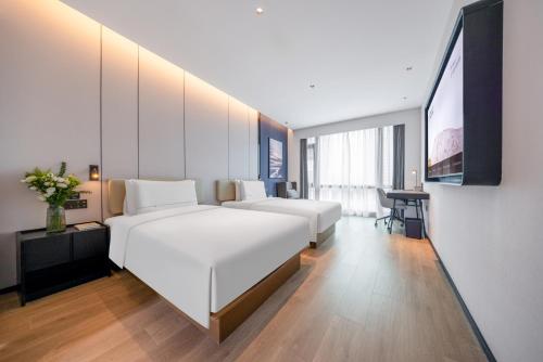 Imagen de la habitación del Hotel Atour Chongqing West Railway Station Longhu Yunlingtian Street. Foto 3