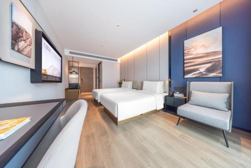 Imagen de la habitación del Hotel Atour Chongqing West Railway Station Longhu Yunlingtian Street. Foto 5