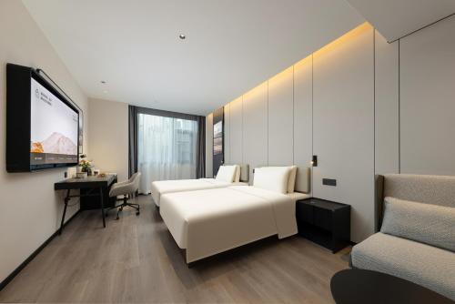Imagen de la habitación del Hotel Atour Dali Erhai International Convention and Exhibition Center. Foto 3