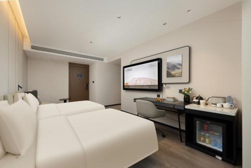 Imagen de la habitación del Hotel Atour Dali Erhai International Convention and Exhibition Center. Foto 4