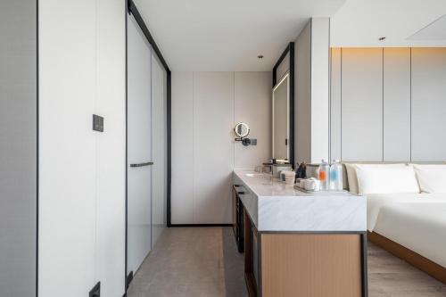 Imagen de la habitación del Hotel Atour Dali Erhai Park. Foto 8