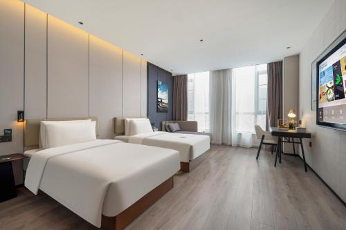 Imagen de la habitación del Hotel Atour Dali Erhai Park. Foto 13