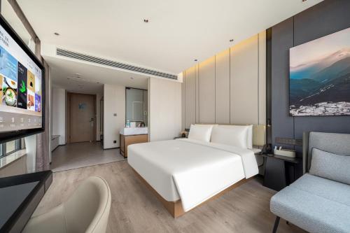 Imagen de la habitación del Hotel Atour Dali Erhai Park. Foto 14