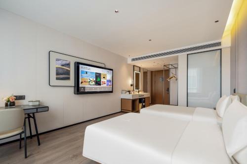 Imagen de la habitación del Hotel Atour Dali Erhai Park. Foto 15