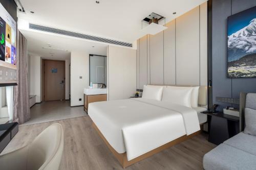 Imagen de la habitación del Hotel Atour Dali Erhai Park. Foto 17