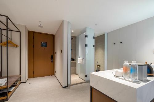 Imagen de la habitación del Hotel Atour Dali Erhai Park. Foto 19