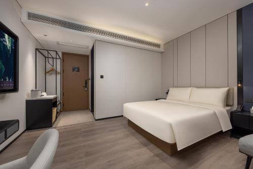 Imagen de la habitación del Hotel Atour Dali Xiaguan Taiye International Plaza. Foto 13