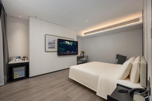 Imagen de la habitación del Hotel Atour Dali Xiaguan Taiye International Plaza. Foto 20