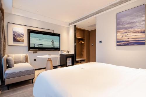 Imagen de la habitación del Hotel Atour Dalian Development Zone. Foto 13