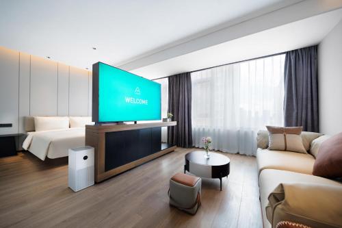 Imagen de la habitación del Hotel Atour Dalian Development Zone. Foto 14