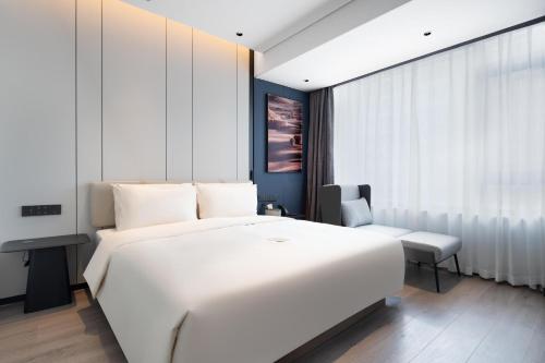 Imagen de la habitación del Hotel Atour Dalian Development Zone. Foto 15