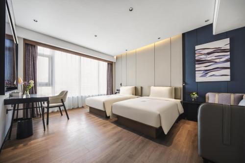 Imagen de la habitación del Hotel Atour Dalian Development Zone. Foto 16