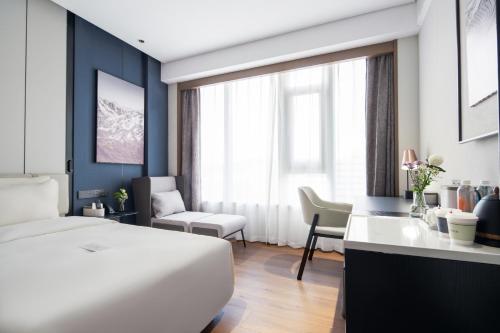 Imagen de la habitación del Hotel Atour Dalian Development Zone. Foto 18