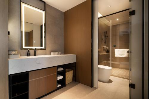 Imagen de la habitación del Hotel Atour Dalian Development Zone. Foto 19