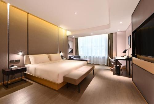 Imagen de la habitación del Hotel Atour Dalian Hi-tech Zone. Foto 7