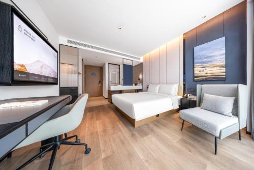 Imagen de la habitación del Hotel Atour Dazhou Renhe New Town East Baqu Road. Foto 14