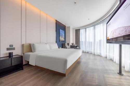 Imagen de la habitación del Hotel Atour Dazhou Renhe New Town East Baqu Road. Foto 15