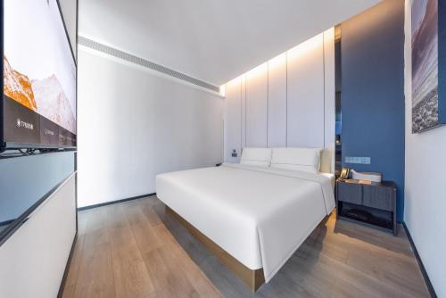 Imagen de la habitación del Hotel Atour Dazhou Renhe New Town East Baqu Road. Foto 16