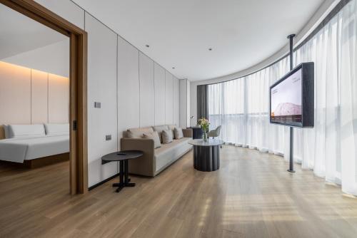 Imagen de la habitación del Hotel Atour Dazhou Renhe New Town East Baqu Road. Foto 19