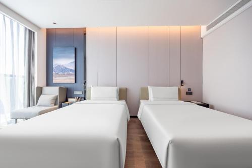 Imagen de la habitación del Hotel Atour Dazhou Renhe New Town East Baqu Road. Foto 20