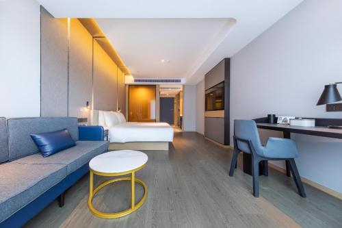 Imagen de la habitación del Hotel Atour Dongguan Fenggang. Foto 11