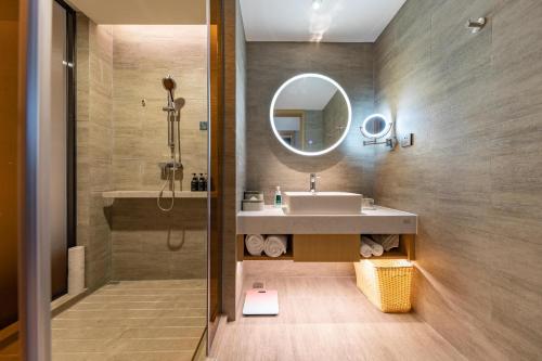 Imagen de la habitación del Hotel Atour Dongguan Fenggang. Foto 14