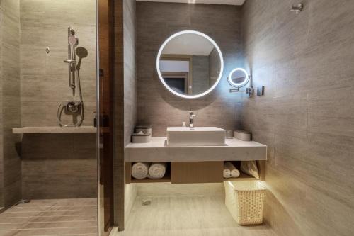 Imagen de la habitación del Hotel Atour Dongguan Fenggang. Foto 15