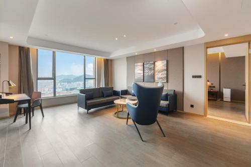 Imagen de la habitación del Hotel Atour Dongguan Fenggang. Foto 16