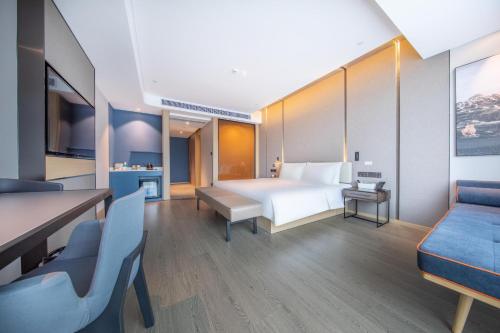 Imagen de la habitación del Hotel Atour Dongguan Fenggang. Foto 17