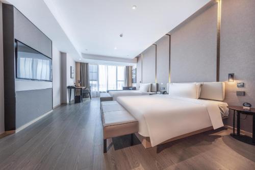 Imagen de la habitación del Hotel Atour Dongguan Fenggang. Foto 18