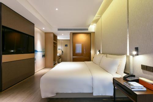 Imagen de la habitación del Hotel Atour Dongguan Nancheng International Trade Center. Foto 8