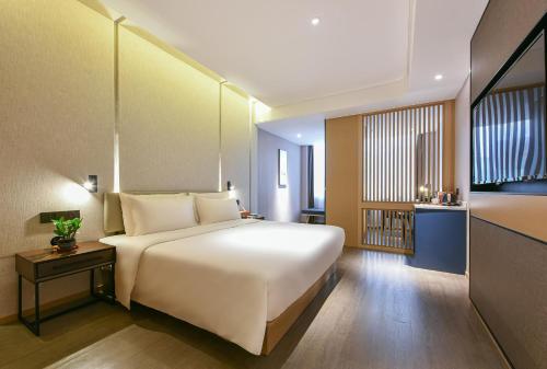 Imagen de la habitación del Hotel Atour Dongguan Nancheng International Trade Center. Foto 9