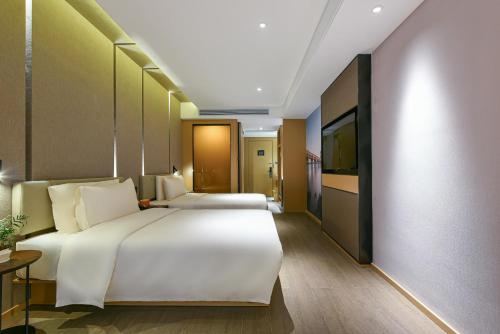 Imagen de la habitación del Hotel Atour Dongguan Nancheng International Trade Center. Foto 10