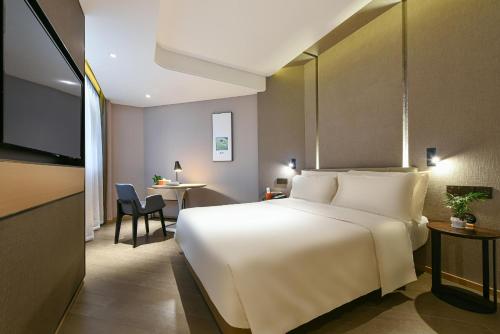Imagen de la habitación del Hotel Atour Dongguan Nancheng International Trade Center. Foto 11