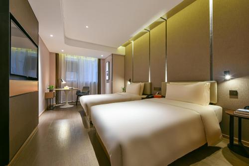 Imagen de la habitación del Hotel Atour Dongguan Nancheng International Trade Center. Foto 12