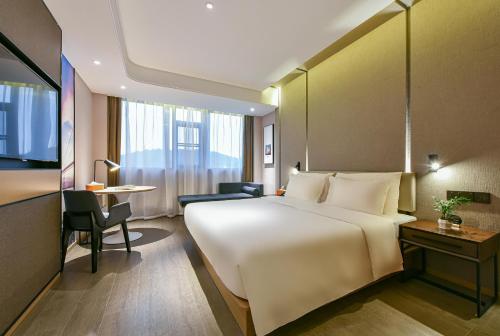 Imagen de la habitación del Hotel Atour Dongguan Nancheng International Trade Center. Foto 14