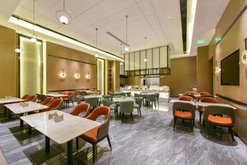 Imagen del bar/restaurante del Hotel Atour Dongguan Nancheng International Trade Center. Foto 7