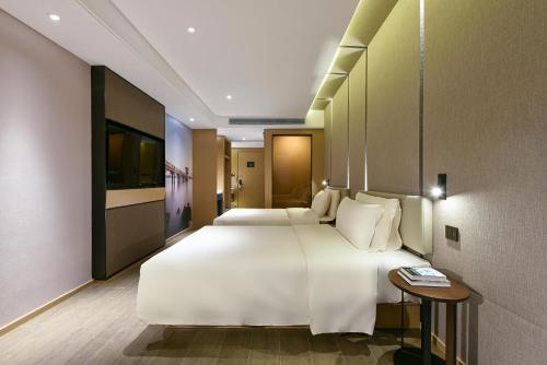 Imagen de la habitación del Hotel Atour Dongguan Nancheng International Trade Center. Foto 17