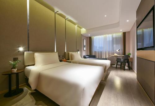 Imagen de la habitación del Hotel Atour Dongguan Nancheng International Trade Center. Foto 18