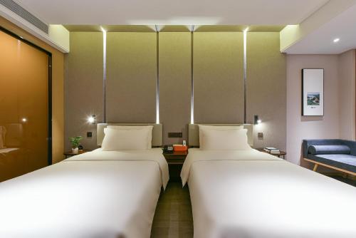 Imagen de la habitación del Hotel Atour Dongguan Nancheng International Trade Center. Foto 20