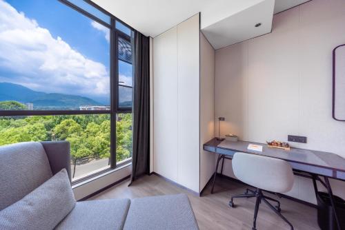 Imagen de la habitación del Hotel Atour Emeishan Railway Station Exiu Lake. Foto 16