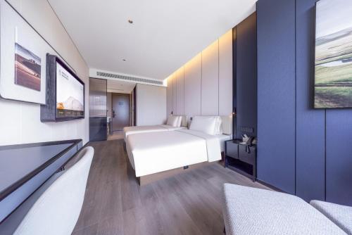 Imagen general del Hotel Atour Emeishan Railway Station Exiu Lake. Foto 4